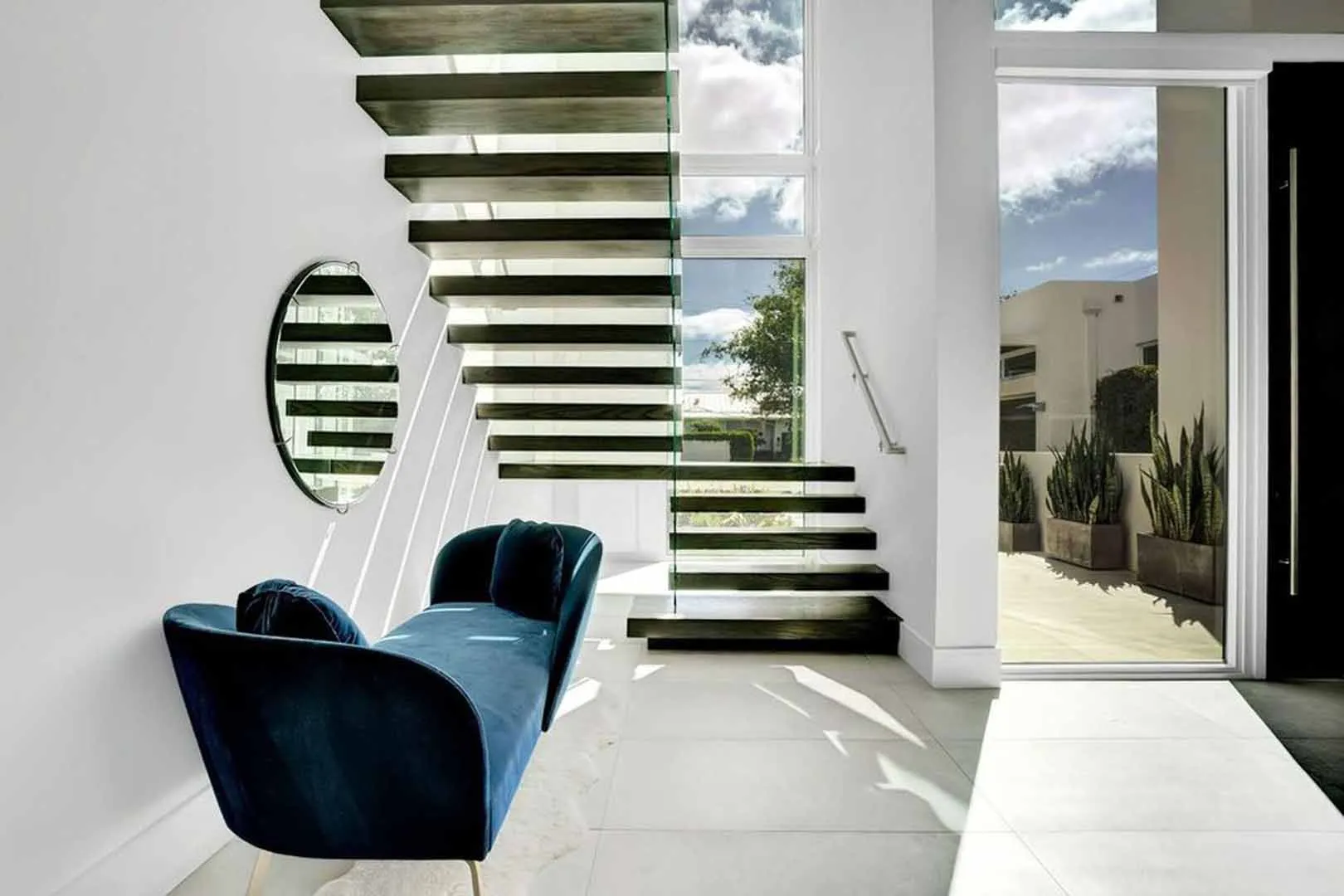 Cantilevered ash stair, Courtyard house